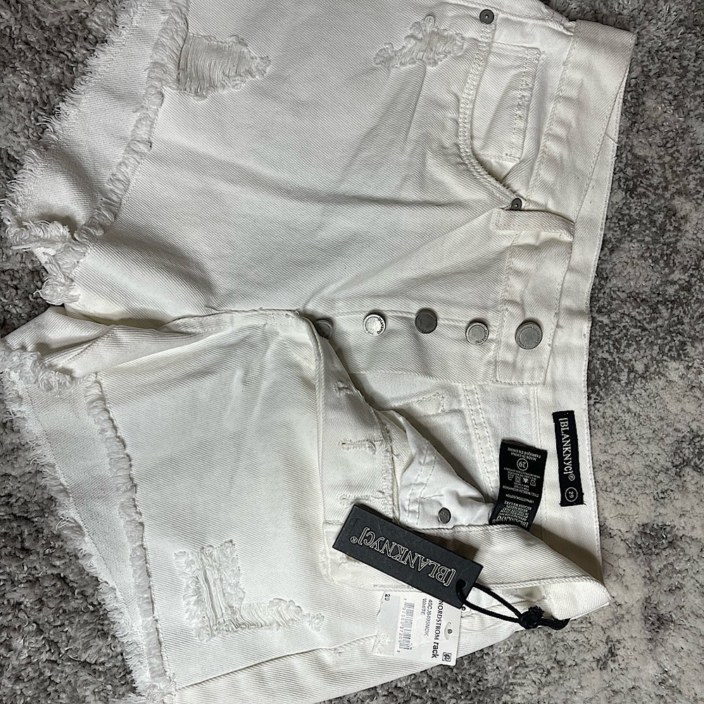 Women’s white Hi Rise Rigid Distressed shorts